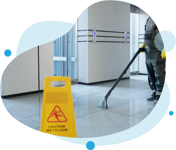 Reinigungspersonal wischt den Boden in einem Büro in München